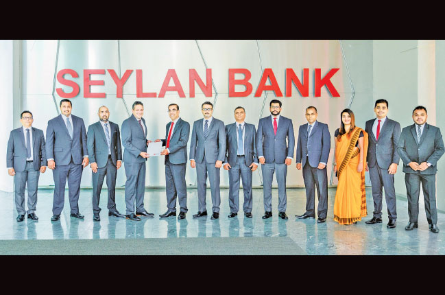 Seylan Bank signs MoU with Sathosa Motors to offer leasing facility for ISUZU vehicles